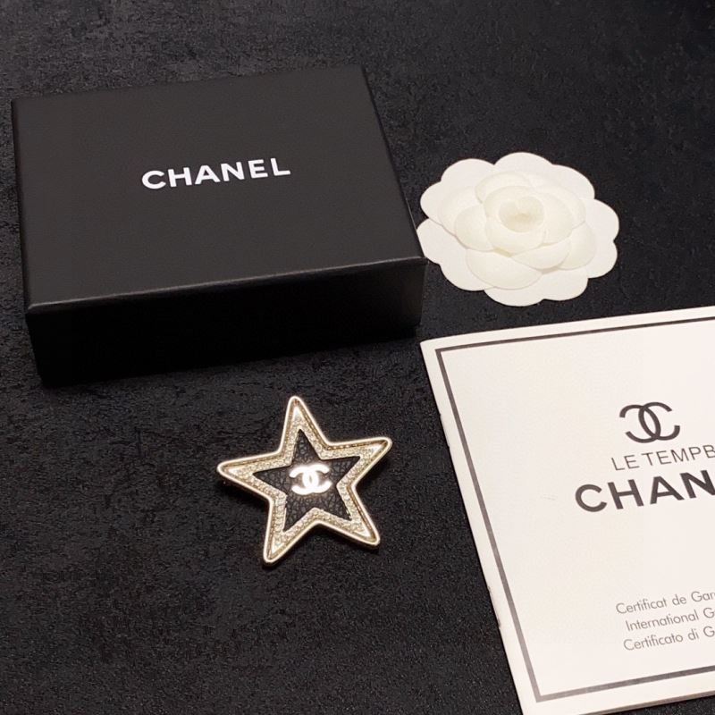 Ch**el brooches